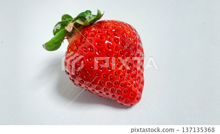 Glossy Amaou strawberries Glossy Amaou strawberries 137135368