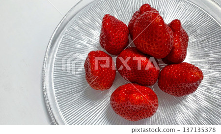 Glossy Amaou strawberries 137135378