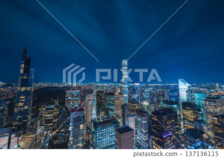 New York city skyline at night with Central Park and modern skyscrapers panorama New York city skyline at night with Central Park and modern skyscrapers panorama 137136115