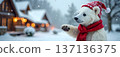 Cute polar bear cub in red scarf and Santa hat in snowy winter village 137136375