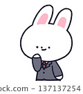 A rabbit in a suit holds one hand up to his face in anticipation 137137254