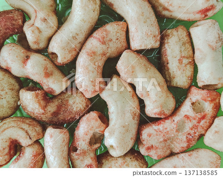 close up of spicy macaroni crackers 137138585