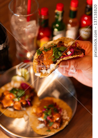 Tacos in hand Tacos in hand 137138820