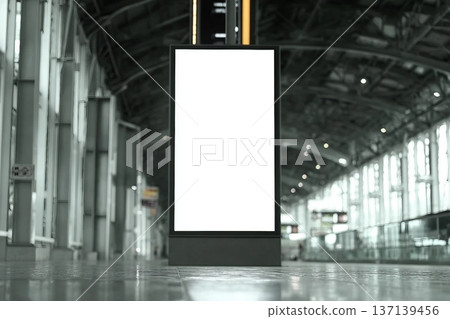 Blank screen advertise mockup in the airport terminal. Display for billboard ad in the building. Poster media template. 137139456