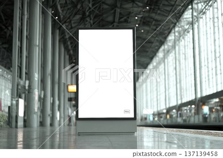 Blank screen advertise mockup in the airport terminal. Display for billboard ad in the building. Poster media template. 137139458