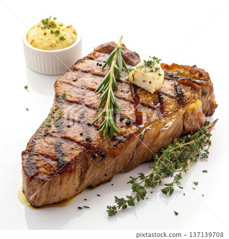 Grilled T Bone Steak with Herb and Butter Glaze 137139708