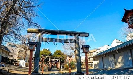 The torii gate of Senju Shrine stands out against the blue sky The torii gate of Senju Shrine stands out against the blue sky 137141137