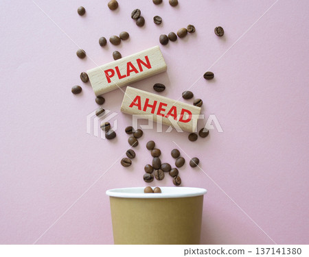 Plan ahead symbol. Wooden blocks with words Plan ahead. Beautiful pink background with coffee cup and coffee beans. Business and Plan ahead concept. Copy space. Plan ahead symbol. Wooden blocks with words Plan ahead. Beautiful pink background with coffee cup and coffee beans. Business and Plan ahead concept. Copy space. 137141380