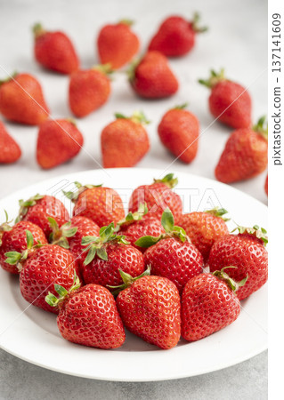 Delicious strawberries in season Delicious strawberries in season 137141609