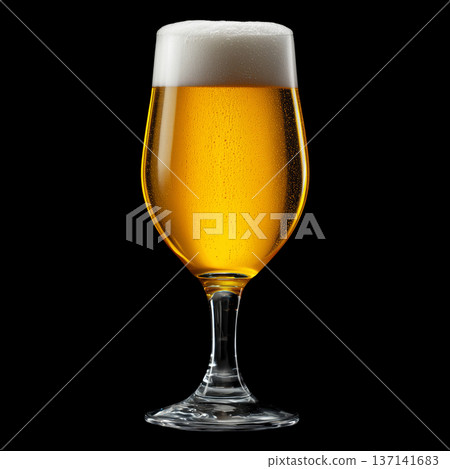 Foamy amber ale beer in a tall tulip glass with creamy foam head, isolated on black background, concept of refreshment and taste Foamy amber ale beer in a tall tulip glass with creamy foam head, isolated on black background, concept of refreshment and taste 137141683