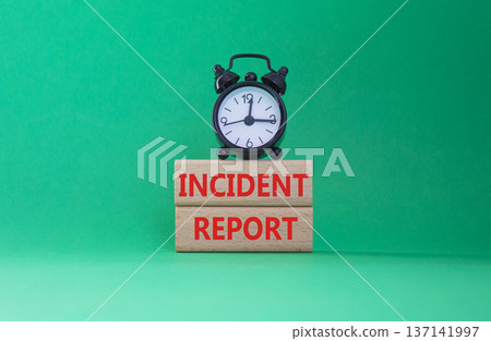 Incident Report symbol. Concept word Incident Report on wooden blocks. Beautiful green background. Business and Incident Report concept. Copy space 137141997