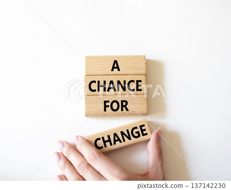 A Chance for Change symbol. Concept words A Chance for Change on wooden blocks. Beautiful bright white background. Businessman hand. Business and A Chance for Change concept. Copy space. A Chance for Change symbol. Concept words A Chance for Change on wooden blocks. Beautiful bright white background. Businessman hand. Business and A Chance for Change concept. Copy space. 137142230
