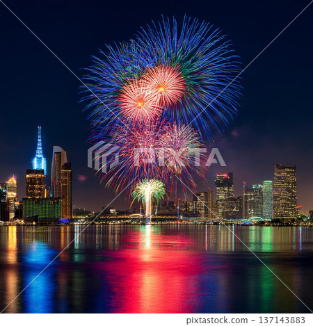 Vibrant Fireworks Lighting Up City Skyline 137143883