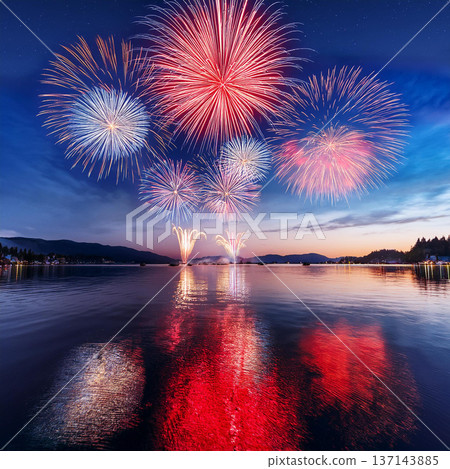 Vibrant Fireworks Lighting Up City Skyline 137143885