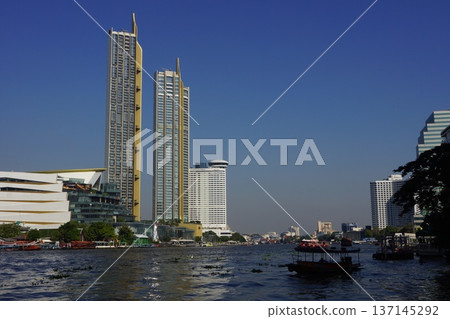 Skyscrapers along the Chao Phraya River in Bangkok, Thailand 137145292