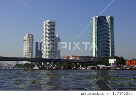 Taksin Bridge along the Chao Phraya River in Bangkok, Thailand Taksin Bridge along the Chao Phraya River in Bangkok, Thailand 137145293
