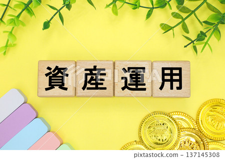 A block with the words "Asset Management" written on it 137145308