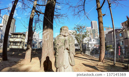 雜司谷貴志茂神堂的石像和東京城市景觀 137145369