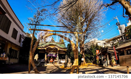 Otori Shrine in Tokyo on a clear day, worship hall and torii gate, passing through the chinowa Otori Shrine in Tokyo on a clear day, worship hall and torii gate, passing through the chinowa 137145706