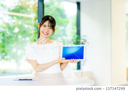 Esthetician young woman Esthetician young woman 137147299