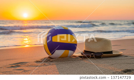 Beach volleyball with straw hat and sunglasses at sunset 137147729