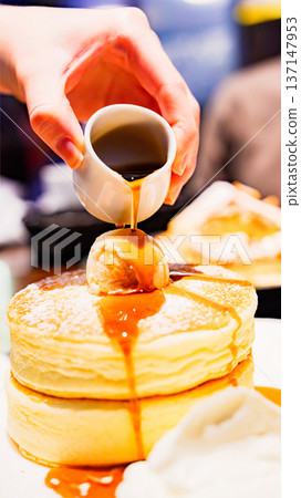 Pancakes and syrup [A trendy dessert that's very popular among women right now] 137147953