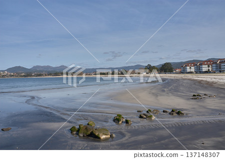 Ladeira Beach in Baiona under a sky of soft clouds reflecting the natural light of March in Galicia Ladeira Beach in Baiona under a sky of soft clouds reflecting the natural light of March in Galicia 137148307