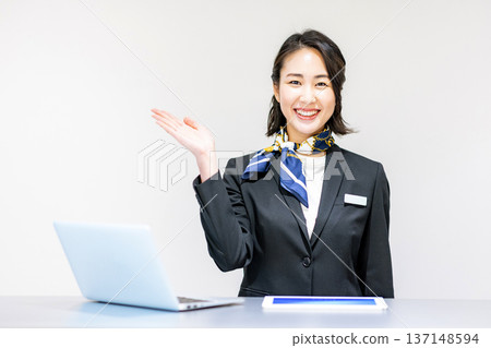 Woman at reception Woman at reception 137148594