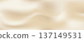 Soft cream gradient background with subtle light waves creating an elegant neutral texture perfect for luxury designs and organic minimalist compositions with warm beige tones. Vector 137149531