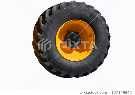 Big wheel of tractor buldozer isolated on white Big wheel of tractor buldozer isolated on white 137149943