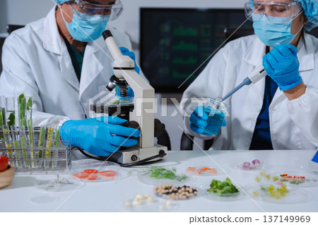 Scientists with research into natural medicine, natural skin care products, laboratories and development concepts. Scientists with research into natural medicine, natural skin care products, laboratories and development concepts. 137149969