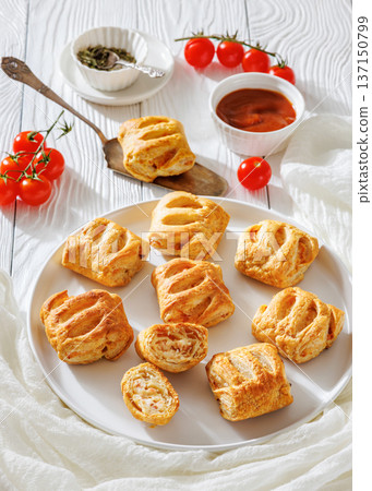puff pastry rolls with ham, rice and cheese 137150799