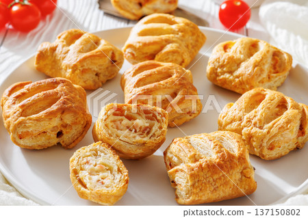 puff pastry rolls with ham, rice and cheese puff pastry rolls with ham, rice and cheese 137150802