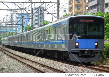 Seibu Shinjuku Line 20000 series running between Takadanobaba and Shimo-Ochiai Seibu Shinjuku Line 20000 series running between Takadanobaba and Shimo-Ochiai 137150879