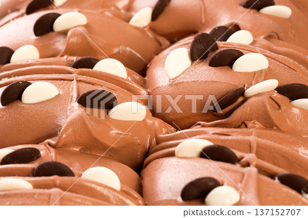 Many cendied on the ice-cream. 137152707