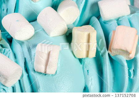 Blue ice-cream with vanilla marsh mellows. 137152708