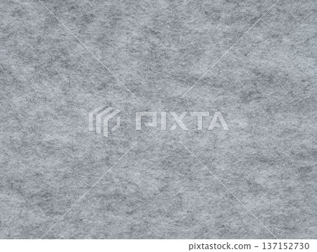 Soft grey felt. Surface of felted fabric texture abstract background in gray color. Pattern for text, lettering, patch work or other art work. Full frame backdrop wallpaper. High resolution photo. Soft grey felt. Surface of felted fabric texture abstract background in gray color. Pattern for text, lettering, patch work or other art work. Full frame backdrop wallpaper. High resolution photo. 137152730