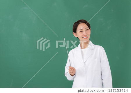 A woman in a white coat A woman in a white coat 137153414