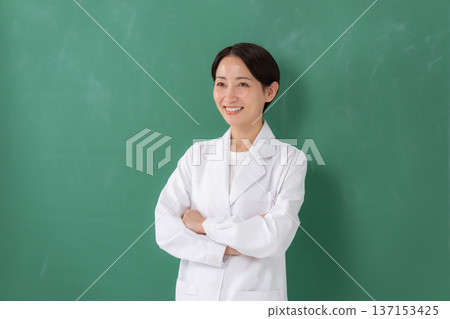 A woman in a white coat A woman in a white coat 137153425