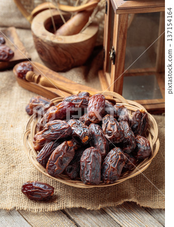Dates fruits on a kitchen table. 137154164