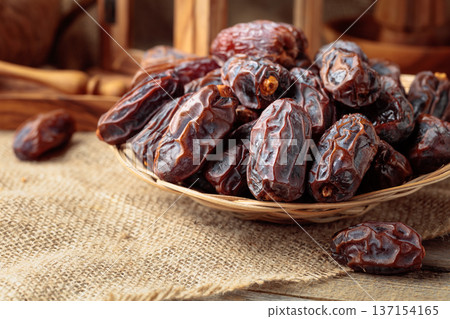 Dates fruits on a kitchen table. 137154165