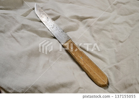 Used Small kitchen knife on coton 137155055