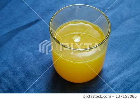 clear glass with a mixture of turmeric and lime clear glass with a mixture of turmeric and lime 137155066