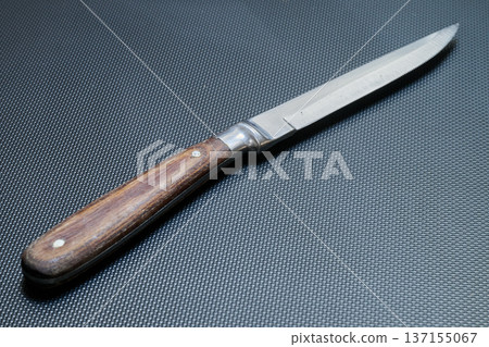 table knife with a worn wooden handle table knife with a worn wooden handle 137155067