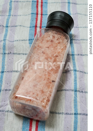 transparent jar of Himalayan pink salt transparent jar of Himalayan pink salt 137155110