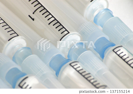 syringes used to administer medicines and vaccines 137155214