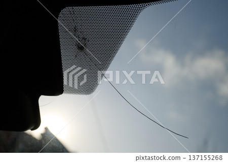 crack and impact on windshield crack and impact on windshield 137155268