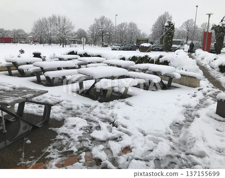 snow covered tables 137155699