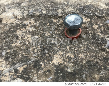 plastic plug with hex head screw anchored to a concrete wall plastic plug with hex head screw anchored to a concrete wall 137156206