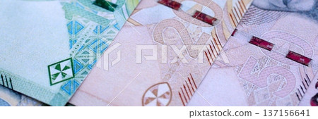 South African rand paper banknotes pile on table. South Africa ZAR currency money bills in big amount. Concept of economics, taxation and banking in South Africa 137156641